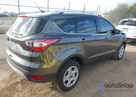 2017 Ford Escape Titanium z USA, uszkodzony, nr VIN 1FMCU0J92HUB02821